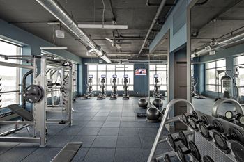 High-endurance fitness center with cardio & strength training equipment